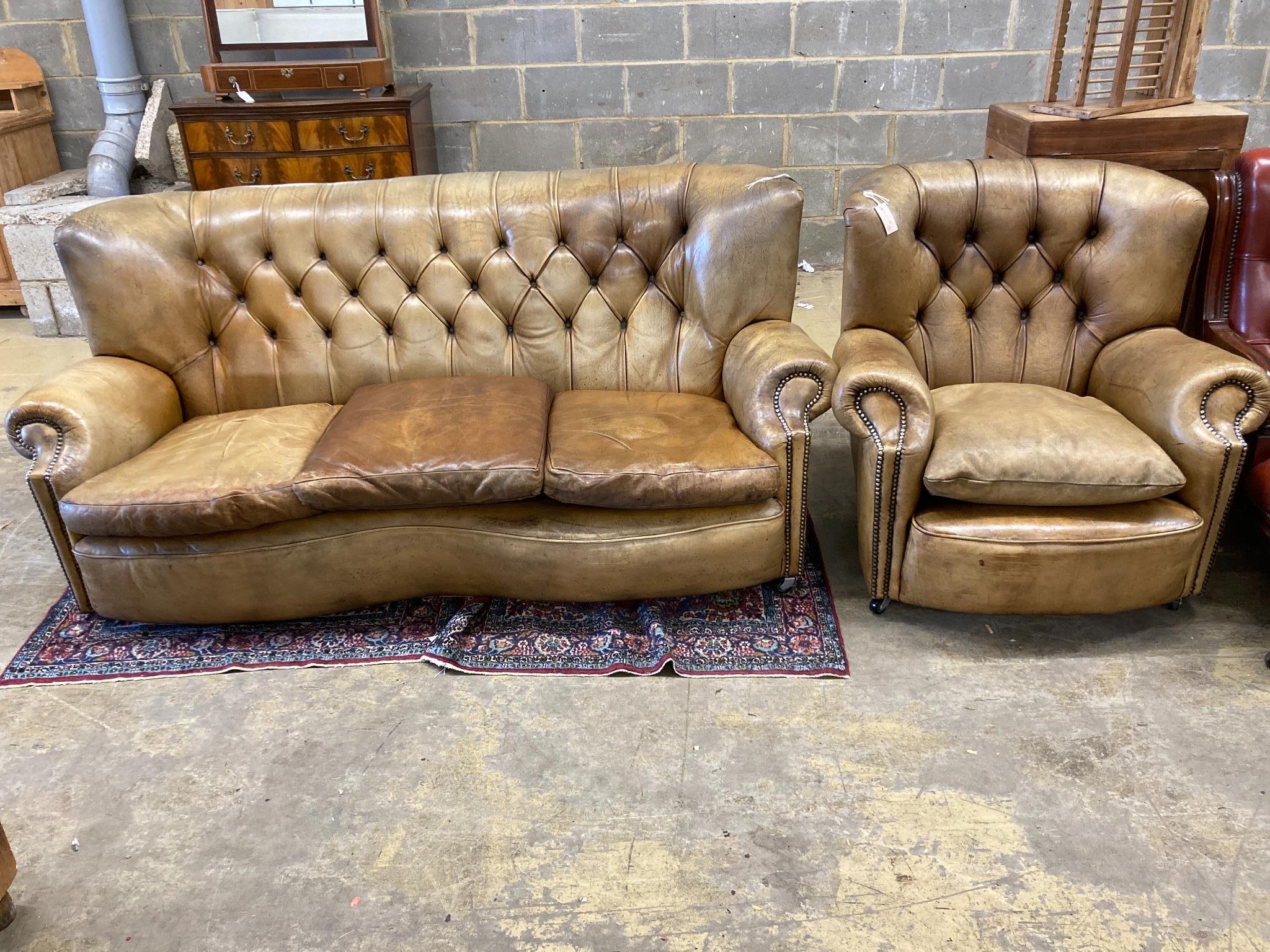 A three-seater Chesterfield leather settee, length 180cm, depth 100cm, height 84cm and a matching armchair